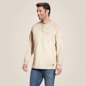 Front view of a man wearing Blue Ariat FR Henley Shirt