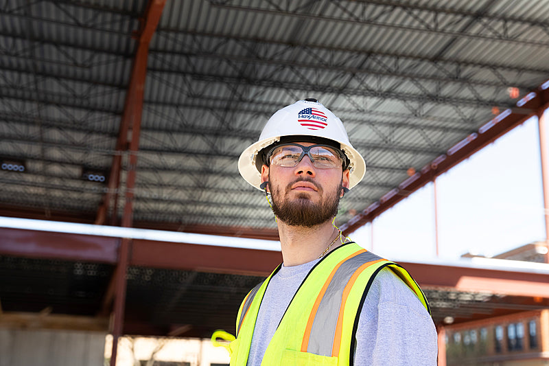A person wearing hexarmor safety glasses