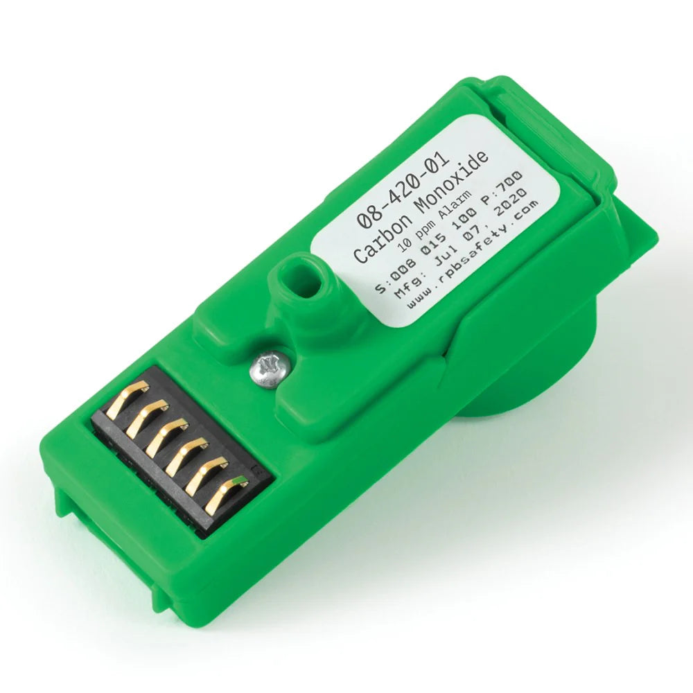 Green electronic sensor with a label on a white background